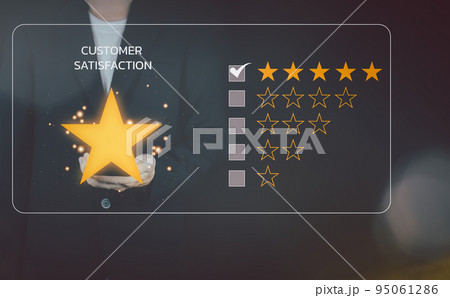 Customer reviews 5 Stars. Customer service evaluation and satisfaction. Businessman hand hold smartphone. Top service, ISO certification, Guarantee, Quality assurance, Standards concept. 95061286