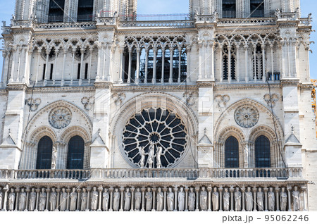 Close up of Notre Dame de Paris monument in Paris, France. Medieval Catholic cathedral currently being under reconstruction after the fire, planned to be completed by Spring 2024 95062246