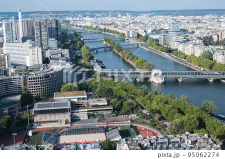 Panoramic view from second floor of Eiffel tower in Paris. View of the buildings, parks, Bridge called Bir-Hakeim over river Seine 95062274