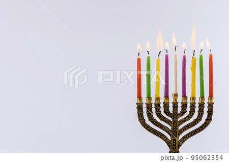 Hanukkah festival symbols of the menorah with copy space white background for the Jewish holiday Hanukkah Hanukkah festival symbols of the menorah with copy space white background for the Jewish holiday Hanukkah 95062354