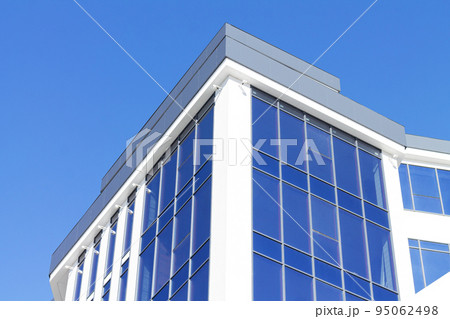 Exterior of modern glass residential or office building 95062498