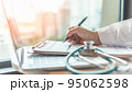 Telehealth, telemedicine medical service and online health care concept with doctor giving medical prescription, analyzing patient health in hospital working on computer laptop 95062598