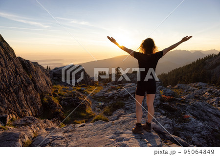 Adventurous Woman Hiker on top of Canadian Mountain Landscape. 95064849
