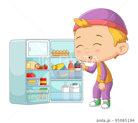 The little boy is very hungry and he opens the refrigerator to take food 95065194