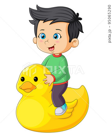 The little boy is sitting on the rubber duck with the happy expression The little boy is sitting on the rubber duck with the happy expression 95065290