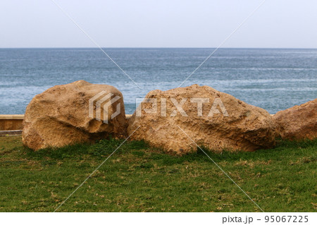Stones in a city park on the Mediterranean coast in Israel. Stones in a city park on the Mediterranean coast in Israel. 95067225