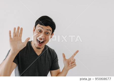 Wow surprise shock face man in black t-shirt isolated on white background. Wow surprise shock face man in black t-shirt isolated on white background. 95068677