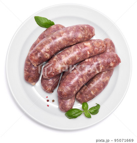 Raw beef or pork grill sausage on ceramic plate isolated on white background 95071669