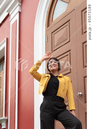 Woman (LGBTQ) posing outdoor fashion style 95073189
