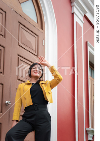 Woman (LGBTQ) posing outdoor fashion style 95073190