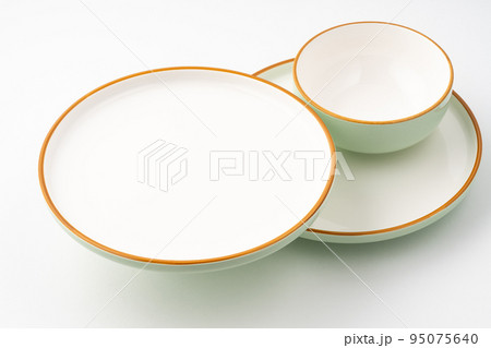 A set of ceramic tableware isolated on white background 95075640