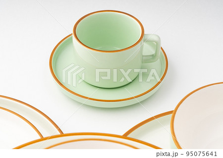 A set of ceramic tableware isolated on white background A set of ceramic tableware isolated on white background 95075641