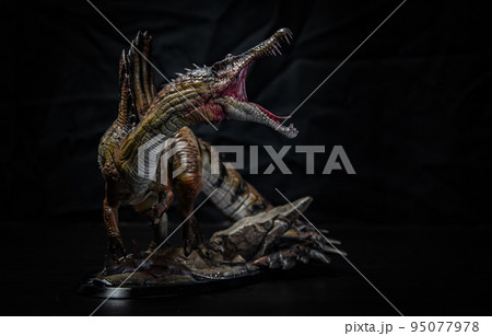 dinosaur , spinosaurus in the dark 95077978