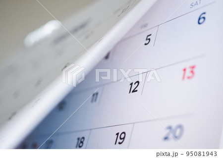calendar page flipping sheet close up background 95081943