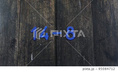 Task in mathematics. Mathematics problem for children. Simple algebra examples using numbers and signs from plastic numbers on a wooden background. Task in mathematics. Mathematics problem for children. Simple algebra examples using numbers and signs from plastic numbers on a wooden background. 95084712