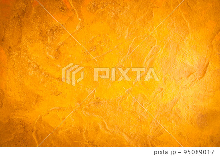 Gold stone texture background. Gold or foil wall texture backdrop design. Walls are decorated with gold-colored filters. Cement orange wall background. gold color wall for the background. Gold stone texture background. Gold or foil wall texture backdrop design. Walls are decorated with gold-colored filters. Cement orange wall background. gold color wall for the background. 95089017