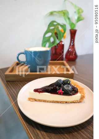 blueberry cheese cake or blueberry cheese pie or blueberry cheese tart, cheese cake and coffee blueberry cheese cake or blueberry cheese pie or blueberry cheese tart, cheese cake and coffee 95090516