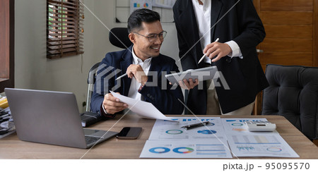 Group of IT consultant working by digital tablet and management big data and analyze financial document of company 95095570