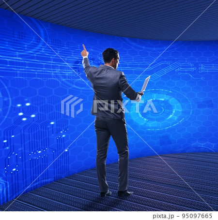Young businessman in data mining concept Young businessman in data mining concept 95097665