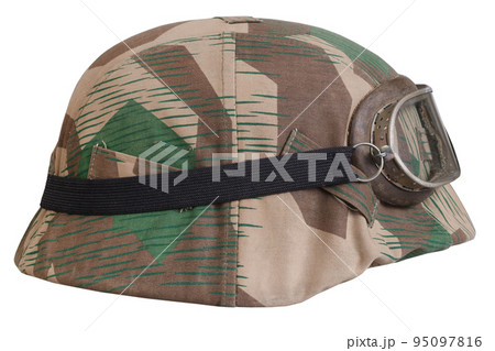 German nazi army helmet with with protective goggles and camouflage cover, type Splinter, helmet M35, M40, M42. German nazi army helmet with with protective goggles and camouflage cover, type Splinter, helmet M35, M40, M42. 95097816