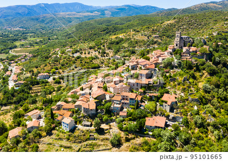Panoramic view from above on the city Eus. Small town located on high mountain. Eastern Pyrenees Panoramic view from above on the city Eus. Small town located on high mountain. Eastern Pyrenees 95101665
