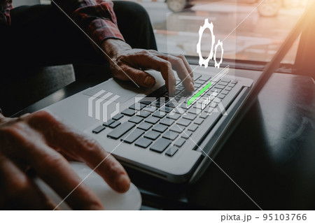 Update progress concept, Person waiting for installing update process with loading bar icon on virtual screen on laptop computer. Update progress concept, Person waiting for installing update process with loading bar icon on virtual screen on laptop computer. 95103766