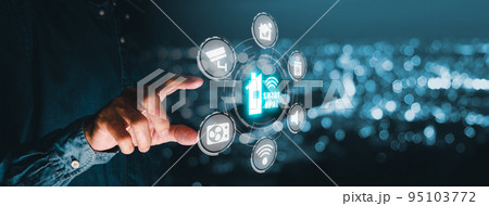 Smart home automation control system, Man hand touching smart home control icon on VR screen with blue bokeh background, Innovation technology internet network concept. Smart home automation control system, Man hand touching smart home control icon on VR screen with blue bokeh background, Innovation technology internet network concept. 95103772
