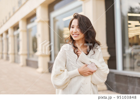 Lifestyle portrait beautiful Asian kazakh woman with brilliant smile Lifestyle portrait beautiful Asian kazakh woman with brilliant smile 95103848