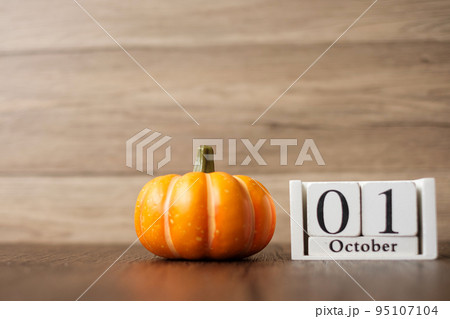 Happy Halloween day with pumpkin and 1 October calendar. Trick or Threat, Hello October, fall autumn, Festive, party and holiday concept Happy Halloween day with pumpkin and 1 October calendar. Trick or Threat, Hello October, fall autumn, Festive, party and holiday concept 95107104