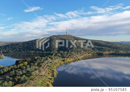 Clear sky and reflection on the lake Clear sky and reflection on the lake 95107585