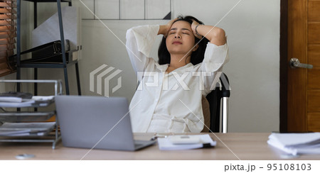 Asian business woman worry about marketing plan of this years. Account, Real Estate Agent, Finance concpet Asian business woman worry about marketing plan of this years. Account, Real Estate Agent, Finance concpet 95108103