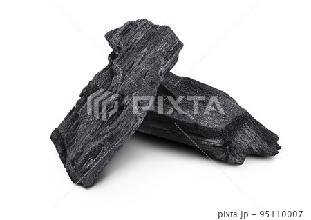 Natural wooden charcoal isolated on white background with full depth of field 95110007
