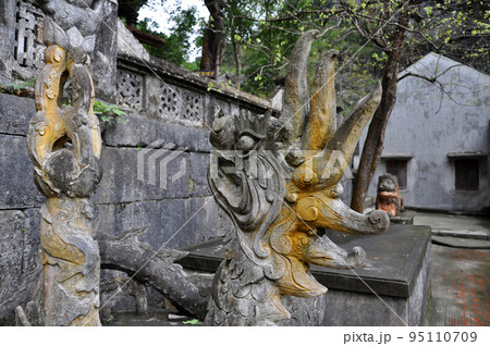 Antique carving in stone with mythical motif. Bich Dong pagoda, Vietnam 95110709