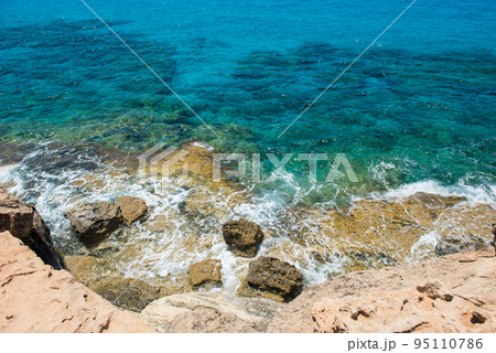 Waves crushing rocky coastline Waves crushing rocky coastline 95110786