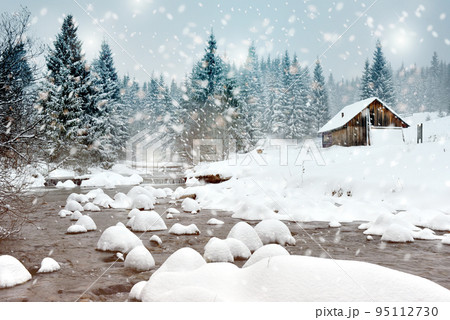 Winter landscape with snowy trees and a mountain hut Winter landscape with snowy trees and a mountain hut 95112730