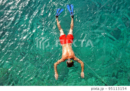 Snorkeling man Snorkeling man 95113154