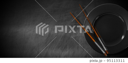 Template for Sushi Menu - Black Plate and Chopsticks on Empty Blackboard 95113311