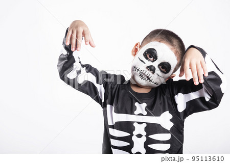 Portrait of Asian little kid boy wearing skeleton costume 95113610