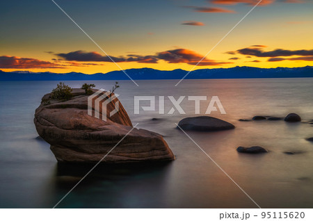Dramatic sunset over the Bonsai Rock of Lake Tahoe, Nevada 95115620