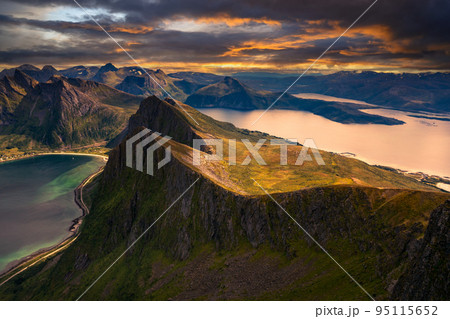 Sunset above the Husfjellet Mountain on Senja Island in northern Norway 95115652
