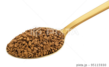 Instant coffee in gold spoon isolated on white background Instant coffee in gold spoon isolated on white background 95115930
