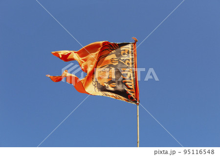 Chatrapati Shivaji Maharaj picture on orange cotton flag, Lohgad Fort, Pune, Maharashtra, India Chatrapati Shivaji Maharaj picture on orange cotton flag, Lohgad Fort, Pune, Maharashtra, India 95116548