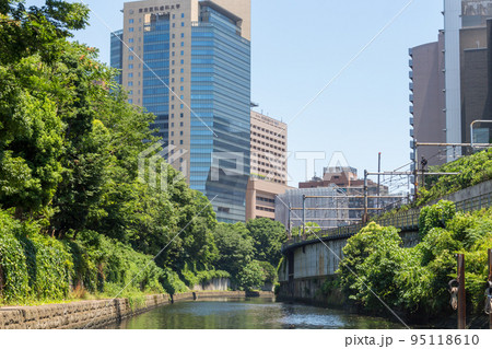 Modern high-rise buildings, viewed from the Sumida river, Tokyo. Modern high-rise buildings, viewed from the Sumida river, Tokyo. 95118610