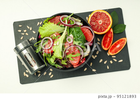 Concept of tasty food, salad with red orange, top view Concept of tasty food, salad with red orange, top view 95121893