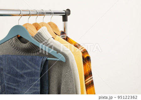 Concept of autumn clothes, autumn season wardrobe Concept of autumn clothes, autumn season wardrobe 95122362