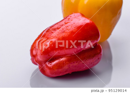 Fresh torn red sweet pepper from the autumn harvest 95129014