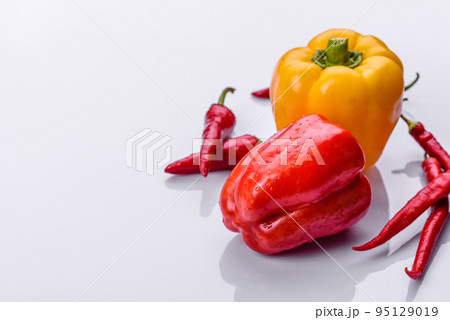 Fresh torn red sweet pepper from the autumn harvest 95129019