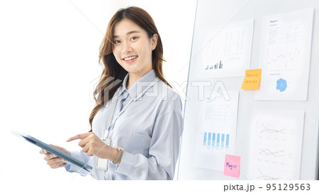 Office worker with a beautiful Asian woman in a private office, Daily routine of office workers, Welcome to work in the morning with a bright smile, Businesswoman in office concept. Office worker with a beautiful Asian woman in a private office, Daily routine of office workers, Welcome to work in the morning with a bright smile, Businesswoman in office concept. 95129563