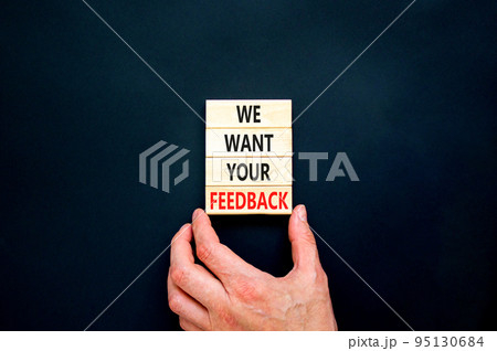Support and we want your feedback symbol. Concept words We want your feedback on wooden blocks on beautiful black background. Businessman hand. Business, support we want your feedback concept. Support and we want your feedback symbol. Concept words We want your feedback on wooden blocks on beautiful black background. Businessman hand. Business, support we want your feedback concept. 95130684