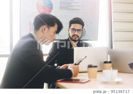 Focus on business man with bread expland financial plans or teach for team employee in office 95136717